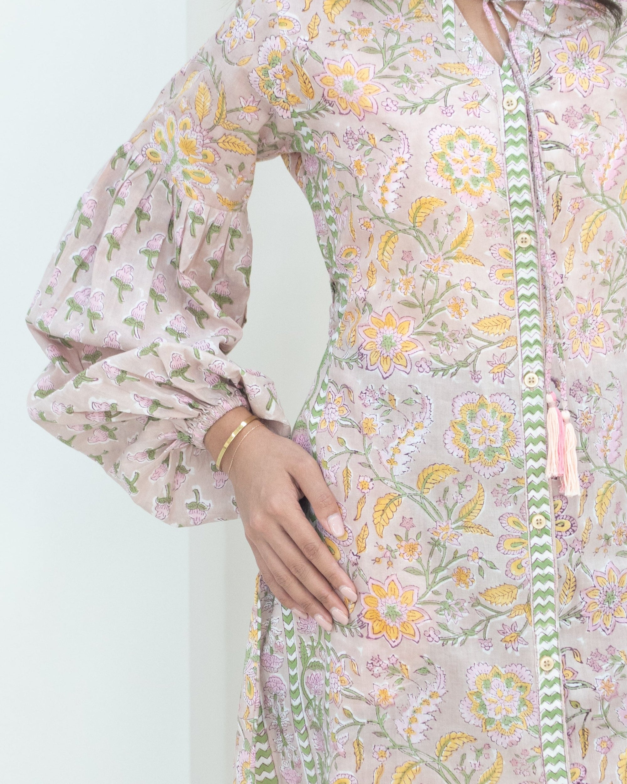Close up of balloon sleeves on pink dress